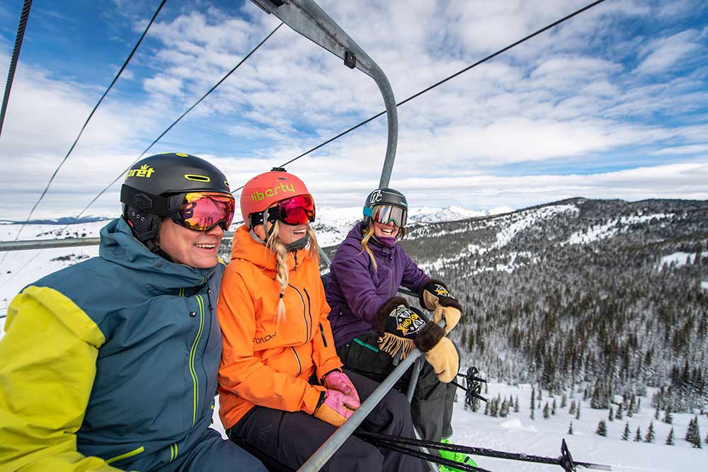 Friends on chairlift in Vail, CO